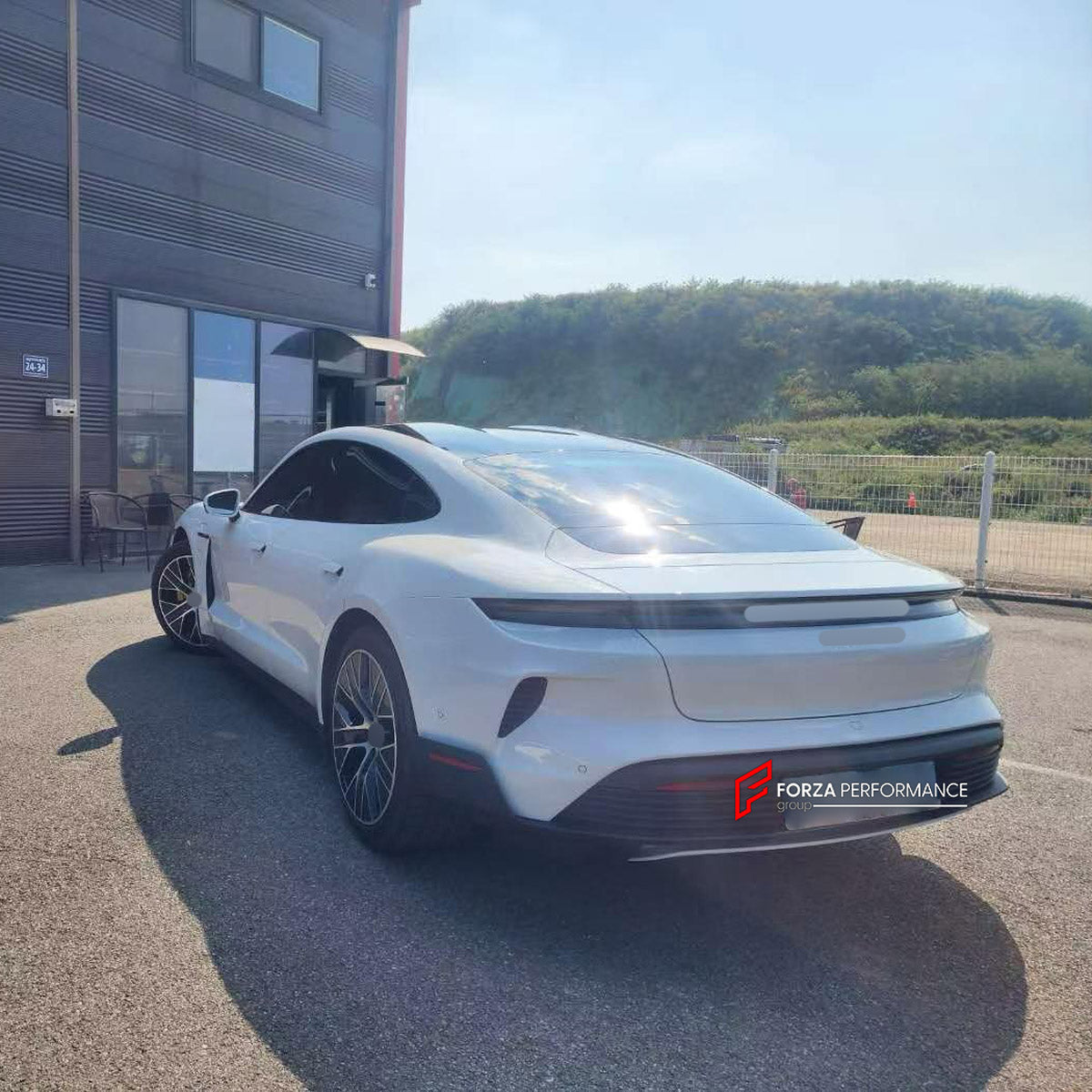 CONVERSION BODY KIT for PORSCHE TAYCAN 9J1.1 2020 - 2024 UPGRADE to TAYCAN TURBO GT 9J1.2 2024+ FORZA PERFORMANCE custom fit Turbo GT Style

Set includes:
Front Lip
Front Bumper Assembly
Rear Bumper Assembly
Rear Diffuser

Material: Plastic

NOTE: Professional installation is required.