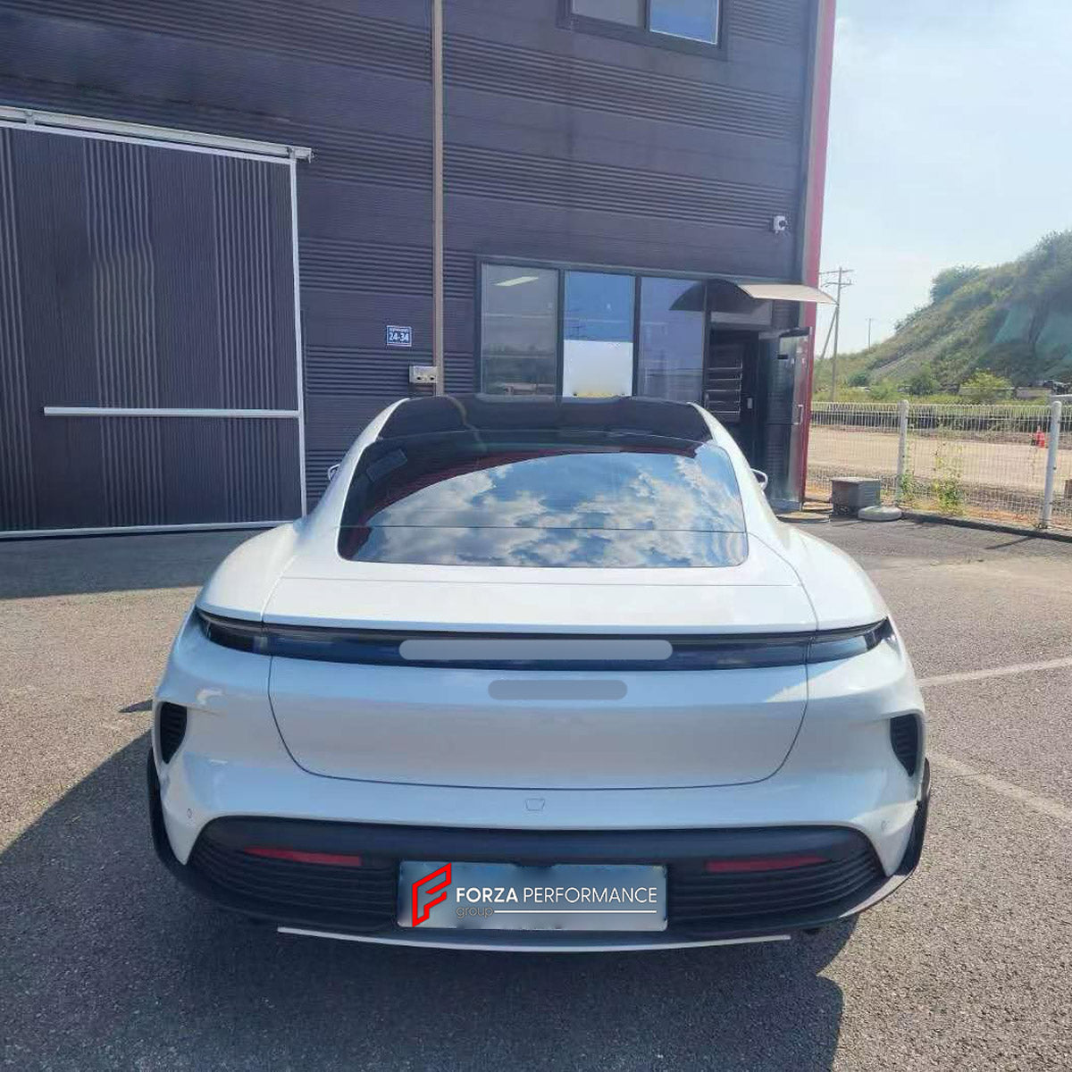 CONVERSION BODY KIT for PORSCHE TAYCAN 9J1.1 2020 - 2024 UPGRADE to TAYCAN TURBO GT 9J1.2 2024+ FORZA PERFORMANCE custom fit Turbo GT Style

Set includes:
Front Lip
Front Bumper Assembly
Rear Bumper Assembly
Rear Diffuser

Material: Plastic

NOTE: Professional installation is required.