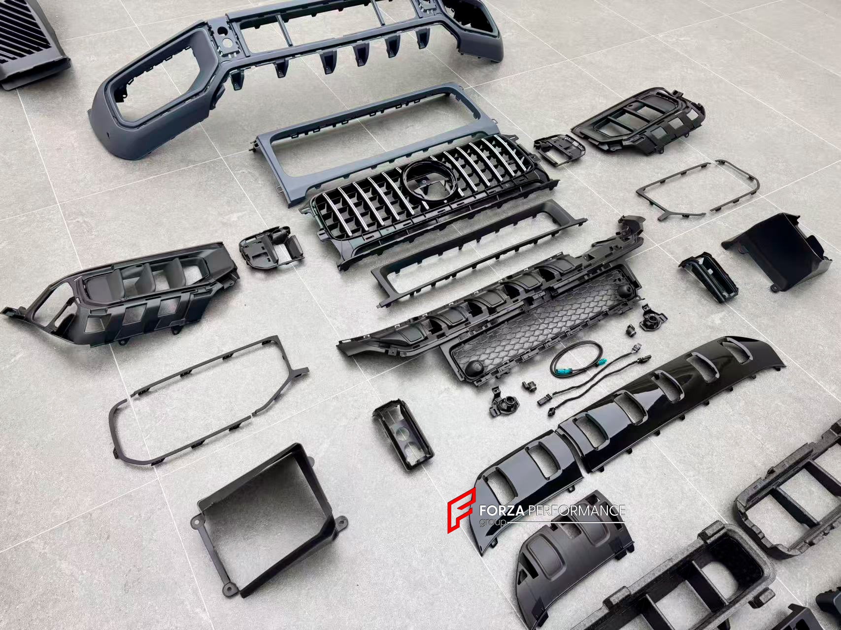 CONVERSION BODY KIT with FRONT BUMPER GRILLE PROTECTOR BULL BAR GUARD for MERCEDES BENZ G CLASS W465 2024+ to G63 AMG W465 2025+

Set includes:

Front Bumper Assembly
Front Skid Plate
Front Fender Liners

Front Grille&nbsp;
Bull Bar

Material: Plastic + Aluminium

NOTE: Professional installation is required