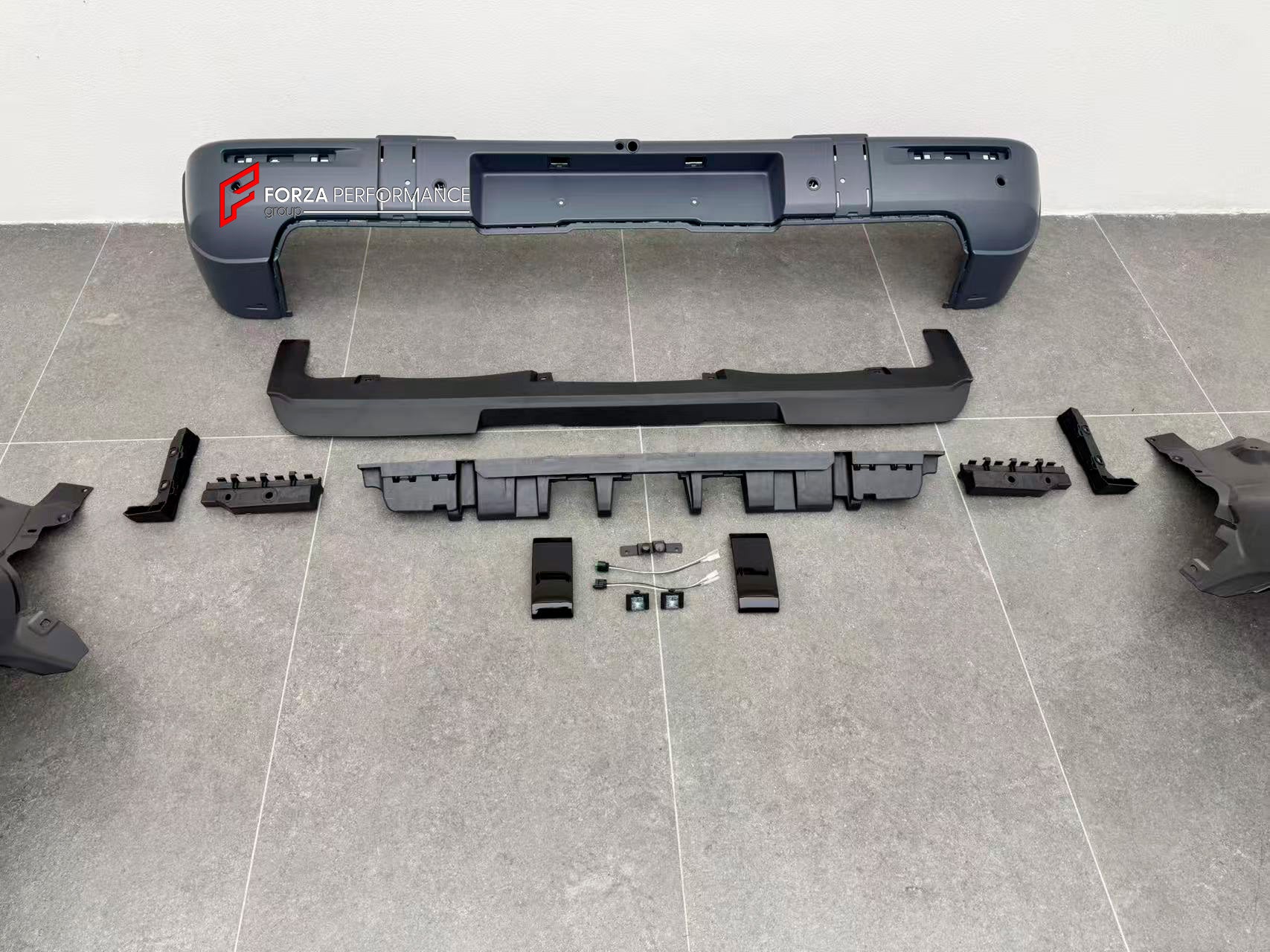 CONVERSION BODY KIT with FRONT BUMPER GRILLE PROTECTOR BULL BAR GUARD for MERCEDES BENZ G CLASS W465 2024+ to G63 AMG W465 2025+

Set includes:

Front Bumper Assembly
Front Skid Plate
Front Fender Liners

Front Grille&nbsp;
Bull Bar

Material: Plastic + Aluminium

NOTE: Professional installation is required