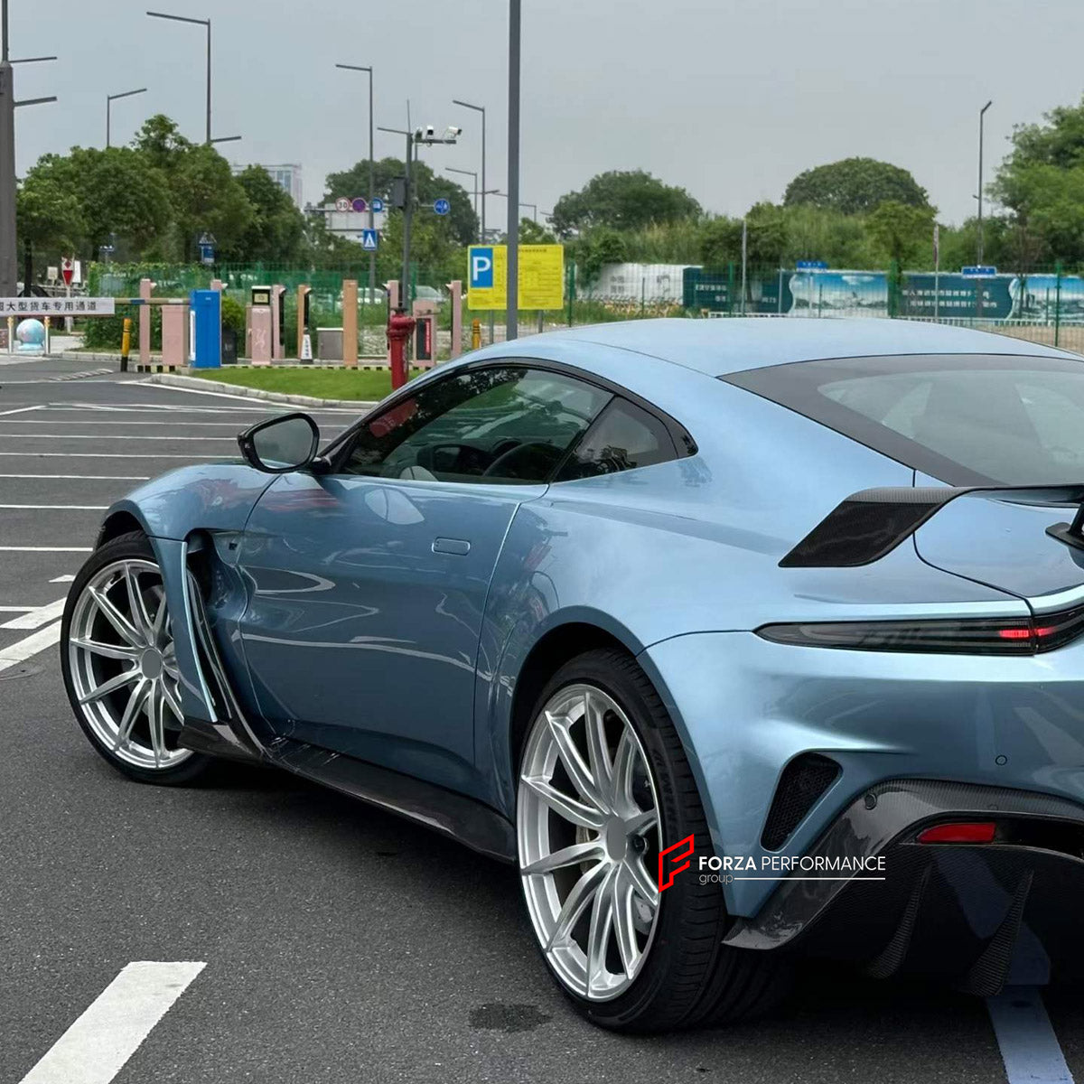 CONVERSION DRY CARBON BODY KIT for ASTON MARTIN VANTAGE AM6 2018 - 2024 UPGRADE to V12 VANTAGE AM6 2022+ FORZA PERFORMANCE custom fit V12 Vantage Style

Set includes:
Front Lip
Front Bumper Assembly
Hood Bonnet
Front Fender Air Vents
Side Skirts
Rear Bumper Assembly
Rear Diffuser
Exhaust Tips

Material: Dry Carbon

NOTE: Professional installation is required.