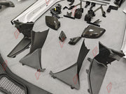 DRY CARBON BODY KIT for LAMBORGHINI HURACAN STO 2021 - 2024 FORZA PERFORMANCE custom fit STO Style

Set includes:
Front Bumper
Front Lip
Hood Bonnet
Front Fenders
Side Skirts
Rear Fenders with Air Intakes
Engine Cover
Rear Bumper
Rear Diffuser
Rear Wing Spoiler

Material: Dry Carbon

NOTE: Professional installation is required.