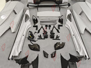 DRY CARBON BODY KIT for LAMBORGHINI HURACAN STO 2021 - 2024 FORZA PERFORMANCE custom fit STO Style

Set includes:
Front Bumper
Front Lip
Hood Bonnet
Front Fenders
Side Skirts
Rear Fenders with Air Intakes
Engine Cover
Rear Bumper
Rear Diffuser
Rear Wing Spoiler

Material: Dry Carbon

NOTE: Professional installation is required.
