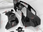 DRY CARBON BODY KIT for LAMBORGHINI HURACAN TECNICA 2022 - 2024 FORZA PERFORMANCE custom fit Tecnica Style

Set includes:
Front Bumper
Front Lip
Hood Bonnet
Side Skirts
Rear Fender Air Intakes
Engine Cover
Rear Bumper
Rear Diffuser
Rear Wing Spoiler

Material: Dry Carbon

NOTE: Professional installation is required.