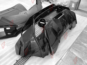 DRY CARBON BODY KIT for LAMBORGHINI HURACAN TECNICA 2022 - 2024 FORZA PERFORMANCE custom fit Tecnica Style

Set includes:
Front Bumper
Front Lip
Hood Bonnet
Side Skirts
Rear Fender Air Intakes
Engine Cover
Rear Bumper
Rear Diffuser
Rear Wing Spoiler

Material: Dry Carbon

NOTE: Professional installation is required.