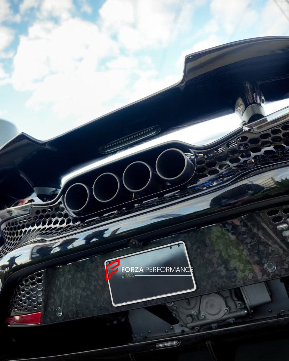 CONVERSION DRY CARBON BODY KIT for MCLAREN 720S COUPE 2017 - 2023 UPGRADE to 765LT 2020 - 2023

Set includes:
Front Lip
Front Bumper Assembly
Headlight Inserts
Front Fenders
Side Skirts
Rear Spoiler
Rear Spoiler Wing
Engine Cover
Rear Diffuser
Exhaust System

Material: Dry Carbon

NOTE: Professional installation is required.