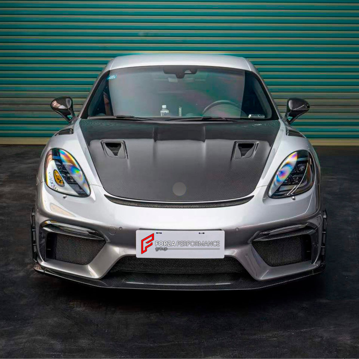 CONVERSION DRY CARBON BODY KIT for PORSCHE 718 982 CAYMAN BOXSTER 2016 - 2025 UPGRADE to GT4 RS 2016 - 2025 FORZA PERFORMANCE custom fit GT4 RS

Set includes:
Front Lip
Front Bumper Assembly
Front Grille
Side Mirror Covers
Rear Spoiler
Rear Diffuser
Exhaust Tips

Material: Dry Carbon, Plastic

NOTE: Professional installation is required.