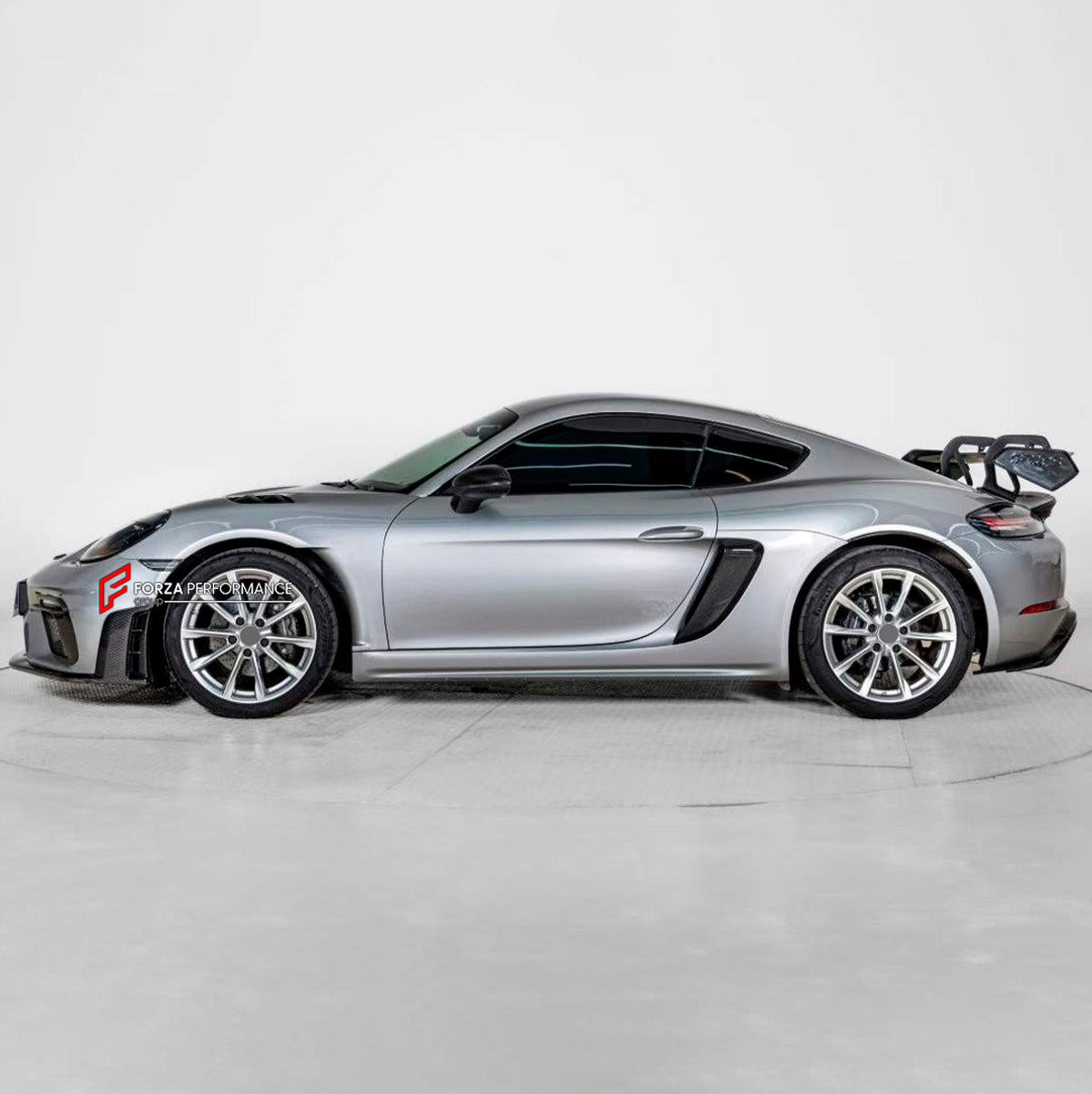 CONVERSION DRY CARBON BODY KIT for PORSCHE 718 982 CAYMAN BOXSTER 2016 - 2025 UPGRADE to GT4 RS 2016 - 2025 FORZA PERFORMANCE custom fit GT4 RS

Set includes:
Front Lip
Front Bumper Assembly
Front Grille
Side Mirror Covers
Rear Spoiler
Rear Diffuser
Exhaust Tips

Material: Dry Carbon, Plastic

NOTE: Professional installation is required.