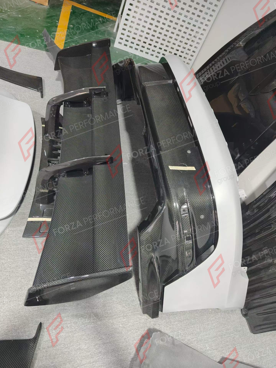 CONVERSION DRY CARBON BODY KIT for PORSCHE 911 992 2019+ UPGRADE to 992 GT3 RS 2022+ FORZA PERFORMANCE custom fit GT3 RS Style

Set includes:
Front Bumper Assembly
Hood Bonnet
Front Fenders
Doors
Side Skirts
Rear Fenders
Rear Spoiler Wing
Rear Bumper
Rear Diffuser

Material: Dry Carbon

NOTE: Professional installation is required.