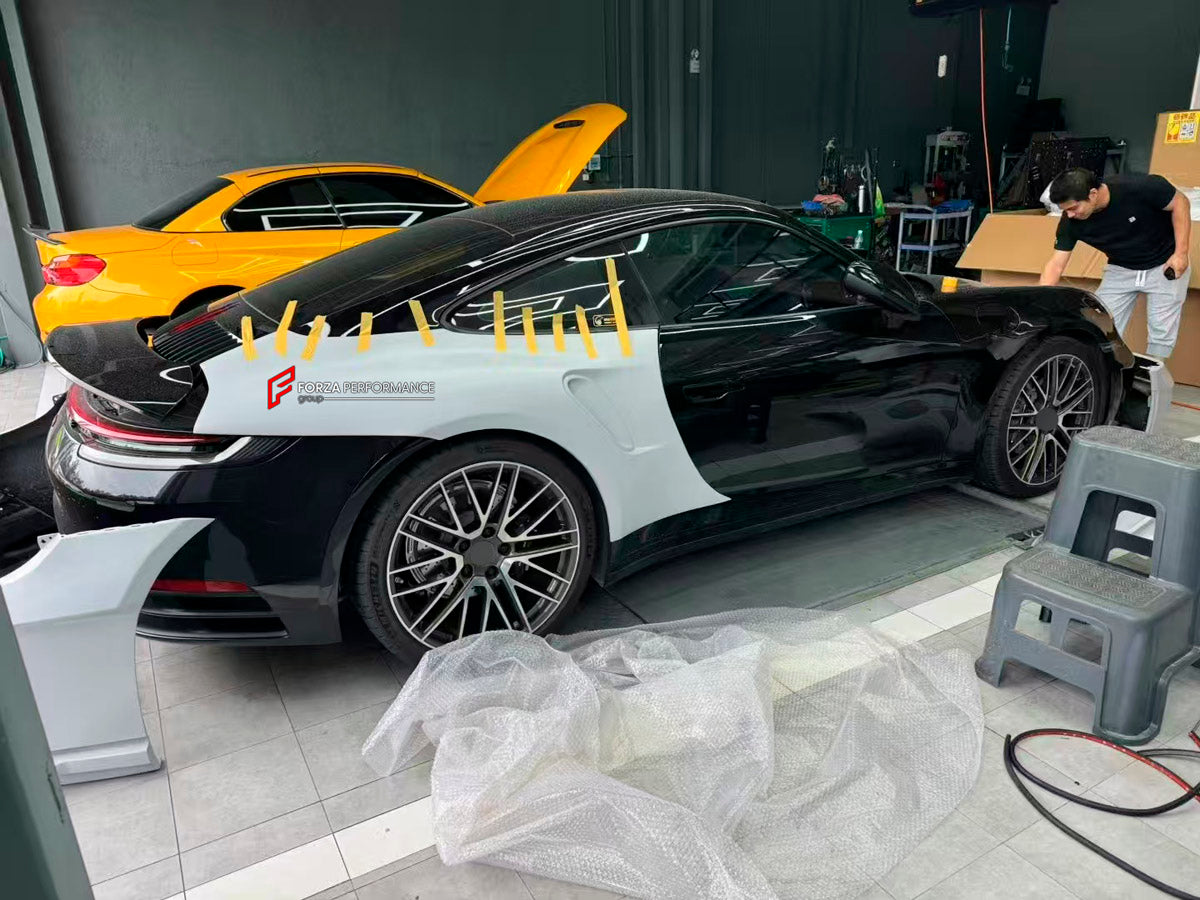 CONVERSION DRY CARBON BODY KIT for PORSCHE 911 992.1 CARRERA CARRERA S 2019 - 2025 UPGRADE to PORSCHE 911 992 GT3 RS 2019 - 2025

Set includes:

Front Bumper
Front Lip
Front Hood
Front Fender Air Vents
Side Door Panels
Side Skirts
Rear Fenders
Rear Bumper
Rear Diffuser
Rear Big Spoiler
Rear Base Spoiler
Rear Engine Hood
Rear Canards
Exhaust System
Material: Dry Carbon

Will Fit: PORSCHE 911 992.1 CARRERA CARRERA S 2019 - 2025

NOTE: Professional installation is required.

Available exclusively at FORZA PERF