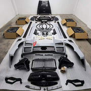 CONVERSION DRY CARBON BODY KIT for ROLLS-ROYCE CULLINAN SERIES I 2018 - 2024 UPGRADE to CULLINAN SERIES II 2024+ FORZA PERFORMANCE custom fit Mansory Style

Set includes:
Front Bumper Assembly
Front Grille
Hood Bonnet
Side Fender Vents
Fender Flares
Side Skirts
Roof Spoiler
Ducktail Spoiler
Rear Window Air Vent Trims
Rear Bumper Assembly
Rear Diffuser
Forged Wheels Rims

Material: Dry Carbon

NOTE: Professional installation is required.