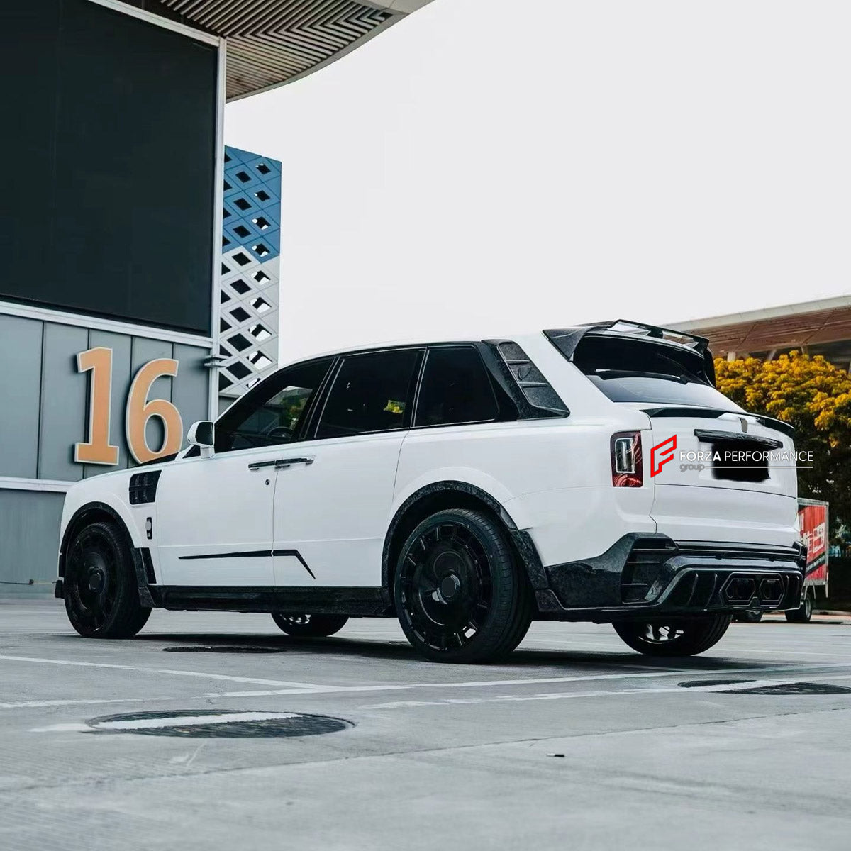 CONVERSION DRY CARBON BODY KIT for ROLLS-ROYCE CULLINAN SERIES I 2018 - 2024 UPGRADE to CULLINAN SERIES II 2024+ FORZA PERFORMANCE custom fit Mansory Style

Set includes:
Front Bumper Assembly
Front Grille
Hood Bonnet
Side Fender Vents
Fender Flares
Side Skirts
Roof Spoiler
Ducktail Spoiler
Rear Window Air Vent Trims
Rear Bumper Assembly
Rear Diffuser
Forged Wheels Rims

Material: Dry Carbon

NOTE: Professional installation is required.