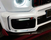 CONVERSION DRY CARBON FOG LIGHT COVERS for MERCEDES-BENZ G-CLASS W463 2008 - 2018 UPGRADE to G-CLASS W464 2019 - 2024

Set includes:
Front Bumper Fog Light Covers

Material: Dry Carbon

NOTE: Professional installation is required.