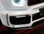 CONVERSION DRY CARBON FOG LIGHT COVERS for MERCEDES-BENZ G-CLASS W463 2008 - 2018 UPGRADE to G-CLASS W464 2019 - 2024

Set includes:
Front Bumper Fog Light Covers

Material: Dry Carbon

NOTE: Professional installation is required.