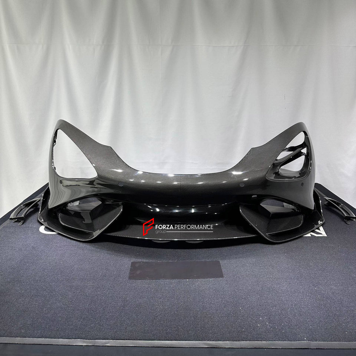 CONVERSION DRY CARBON FRONT BUMPER ASSEMBLY for MCLAREN 720S COUPE 2017 - 2023 UPGRADE to 765LT 2020 - 2023

Set includes:
Front Bumper Assembly

Material: Dry Carbon

NOTE: Professional installation is required.