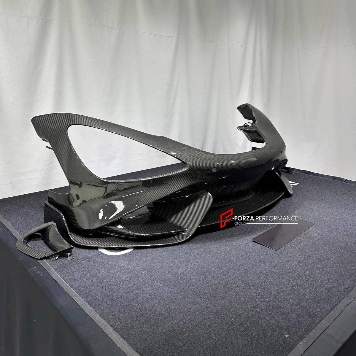 CONVERSION DRY CARBON FRONT BUMPER ASSEMBLY for MCLAREN 720S COUPE 2017 - 2023 UPGRADE to 765LT 2020 - 2023

Set includes:
Front Bumper Assembly

Material: Dry Carbon

NOTE: Professional installation is required.
