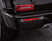 CONVERSION DRY CARBON REAR BUMPER TRIMS for MERCEDES-BENZ G-CLASS W463 2008 - 2018 UPGRADE to G-CLASS W464 2019 - 2024

Set includes:
Rear Bumper Trims

Material: Dry Carbon

NOTE: Professional installation is required.