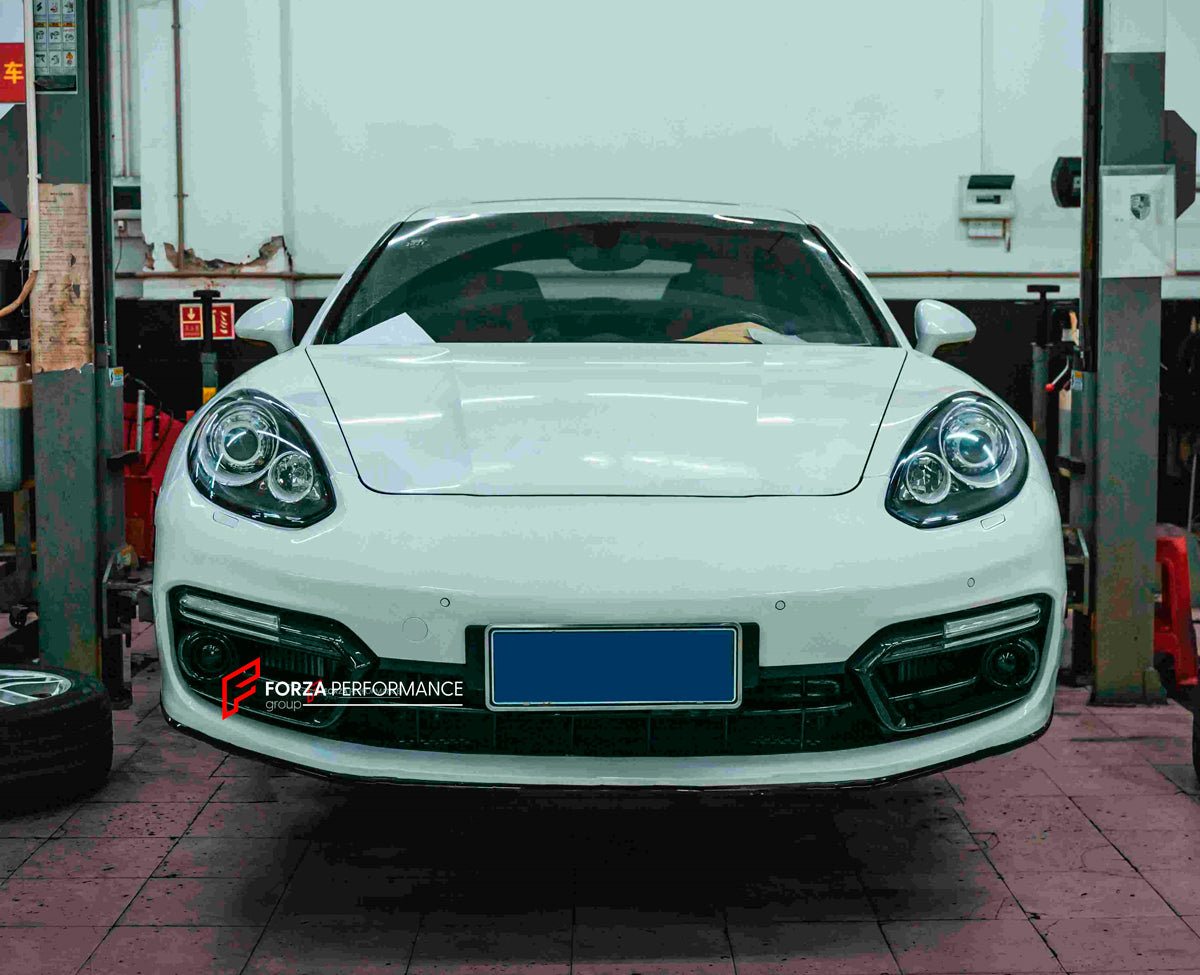 CONVERSION FRONT BUMPER WITH LED LIGHTS for PORSHE PANAMERA 970.2 2013 - 2016 UPGRAGE TO 971.1 2016 - 2020

Set includes:

Front Bumper
Led Lights

Material: Plastic

NOTE: Professional installation is required. Factory LED DRL must be reused