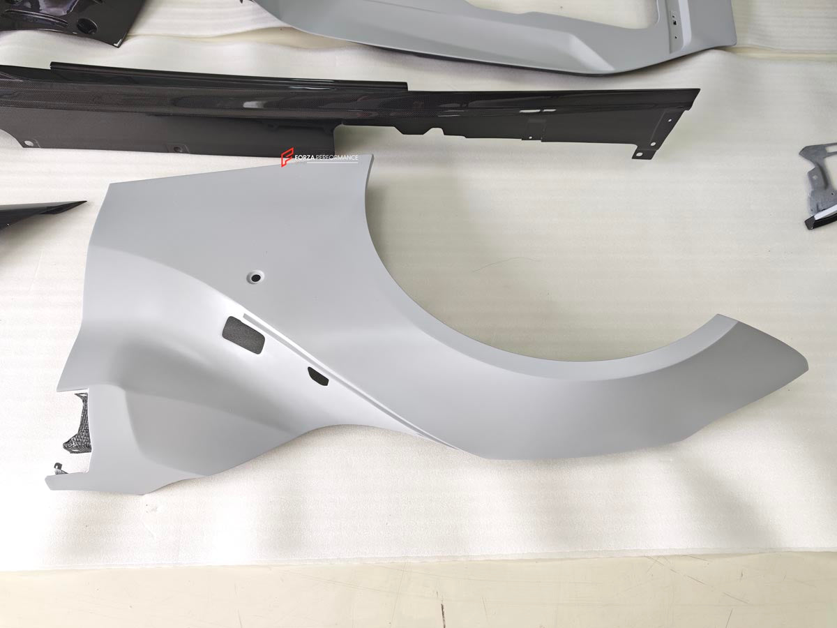 BODY KIT for FERRARI F12 TDR
Set includes:

Front Lip
Front Bumper
Front Air Vent Cover
Front Fenders
Hood/Bonnet
Side Skirts
Rear Diffuser
NOTE: Professional installation is required