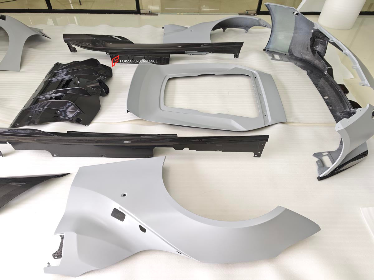 BODY KIT for FERRARI F12 TDR
Set includes:

Front Lip
Front Bumper
Front Air Vent Cover
Front Fenders
Hood/Bonnet
Side Skirts
Rear Diffuser
NOTE: Professional installation is required