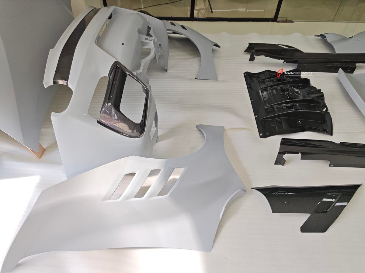 BODY KIT for FERRARI F12 TDR
Set includes:

Front Lip
Front Bumper
Front Air Vent Cover
Front Fenders
Hood/Bonnet
Side Skirts
Rear Diffuser
NOTE: Professional installation is required