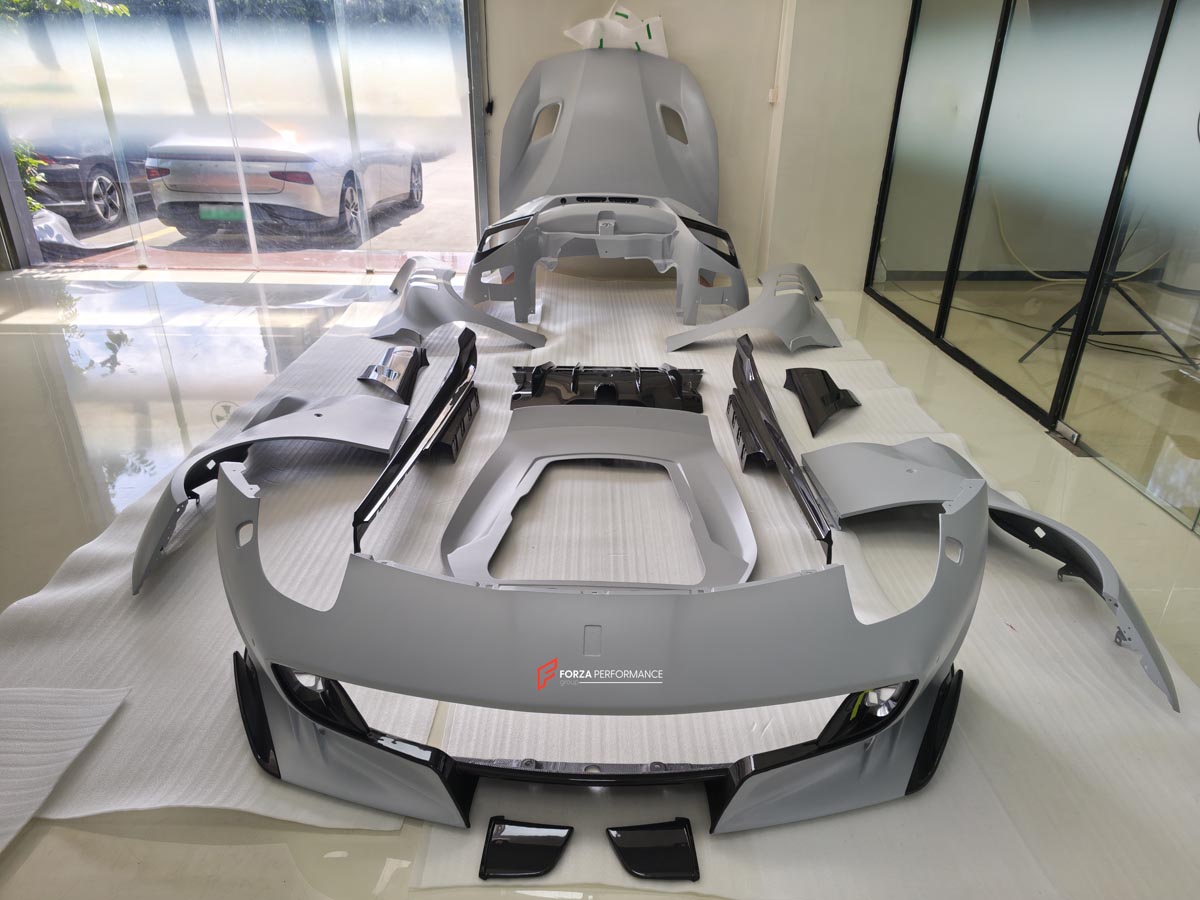 BODY KIT for FERRARI F12 TDR
Set includes:

Front Lip
Front Bumper
Front Air Vent Cover
Front Fenders
Hood/Bonnet
Side Skirts
Rear Diffuser
NOTE: Professional installation is required