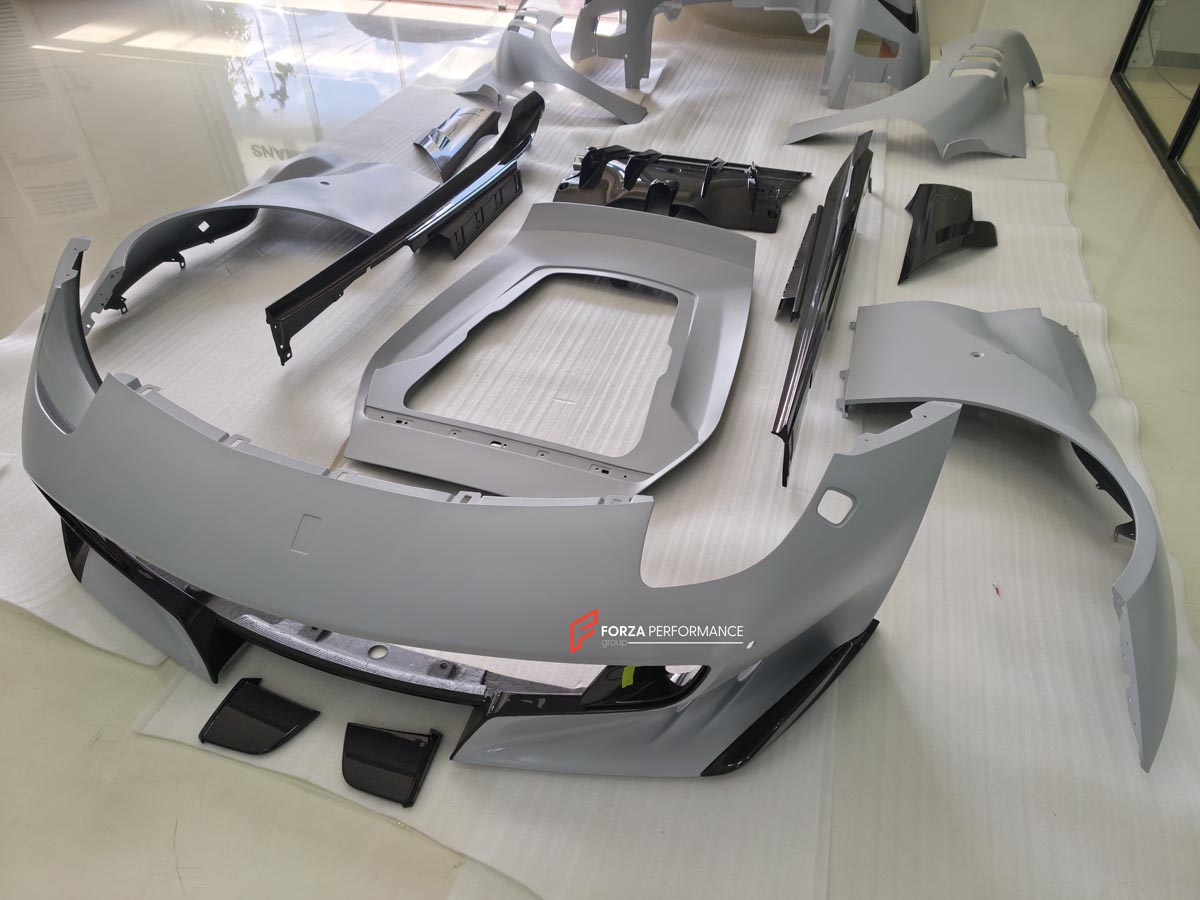 BODY KIT for FERRARI F12 TDR
Set includes:

Front Lip
Front Bumper
Front Air Vent Cover
Front Fenders
Hood/Bonnet
Side Skirts
Rear Diffuser
NOTE: Professional installation is required