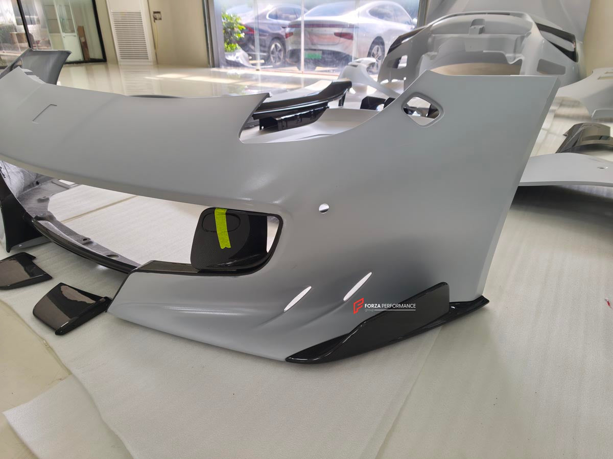 BODY KIT for FERRARI F12 TDR
Set includes:

Front Lip
Front Bumper
Front Air Vent Cover
Front Fenders
Hood/Bonnet
Side Skirts
Rear Diffuser
NOTE: Professional installation is required