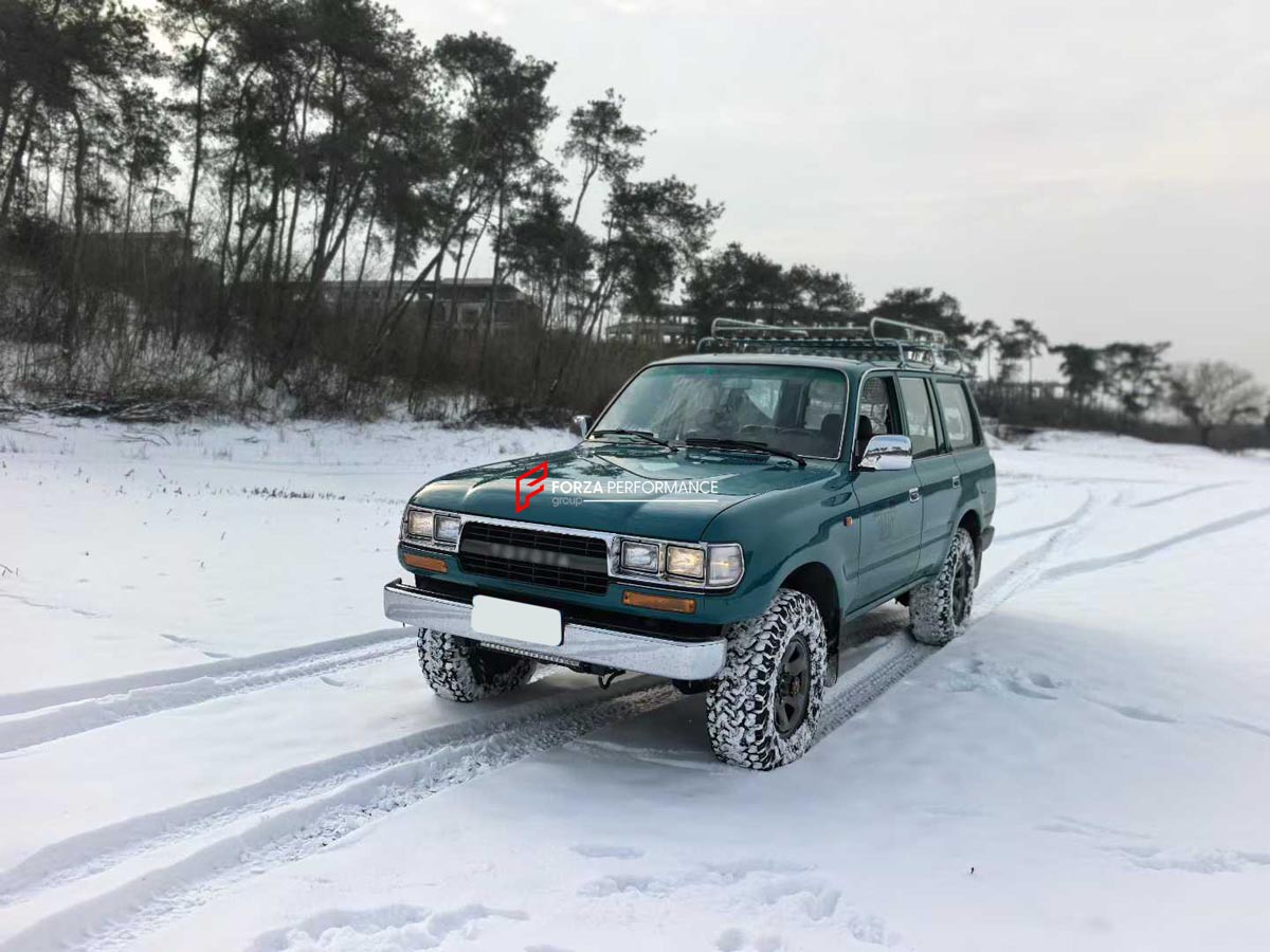 CONVERSION RETRO FRONT BUMPER for TOYOTA LAND CRUISER LC100 1998 - 2007
Set includes:

Front Lip
Front Bumper Assembly
Front Grille
Headlamps
Hood Bonnet
Front Fender Flares
Material: Plastic

NOTE: Professional installation is required.