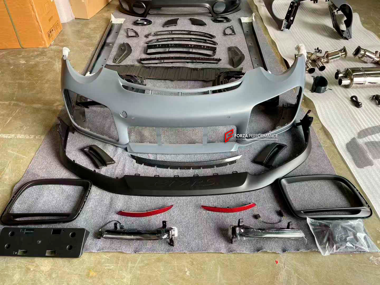 CONVERSION UPGRADE BODY KIT for PORSCHE 911 991.1 991.2 CARRERA NARROW BODY 2011 - 2020 upgrade to GT2RS

Set includes:

Front Lip
Front Bumper Assembly
Front Fenders with Air Vents
Side Skirts

Carbon Hood
Carbon Trunk
Rear Bumper
Exhaust Catback

Material: Plastic