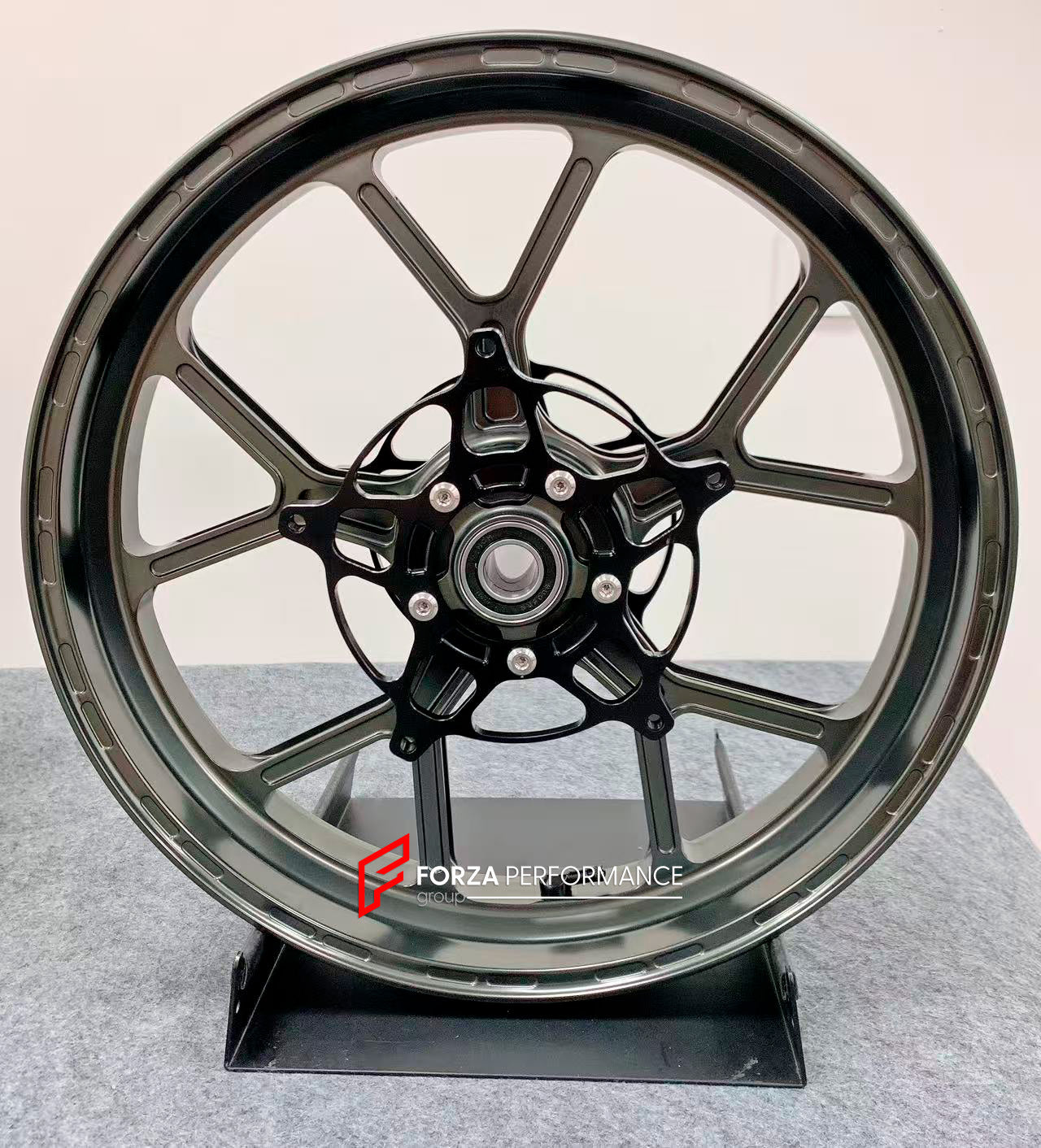 We manufacture premium quality forged motorcycle wheels rims for S1000RR M1000RR in any design, size, color.

Wheel sizes (motorcycle spec):

Front: 3.5 x 17

Rear: 6 x 17

Weight:

Front: 3.45 kg (7.6 lbs)

Rear: 3.75 kg (8.27 lbs)


Finishing: Satin Bronze

Forza Performance Group engineers and manufactures each forged motorcycle wheel individually per order. This ensures precise fitment, uncompromised strength, and unique styling. Whether for racing, touring, or daily use — our wheels are built for both 