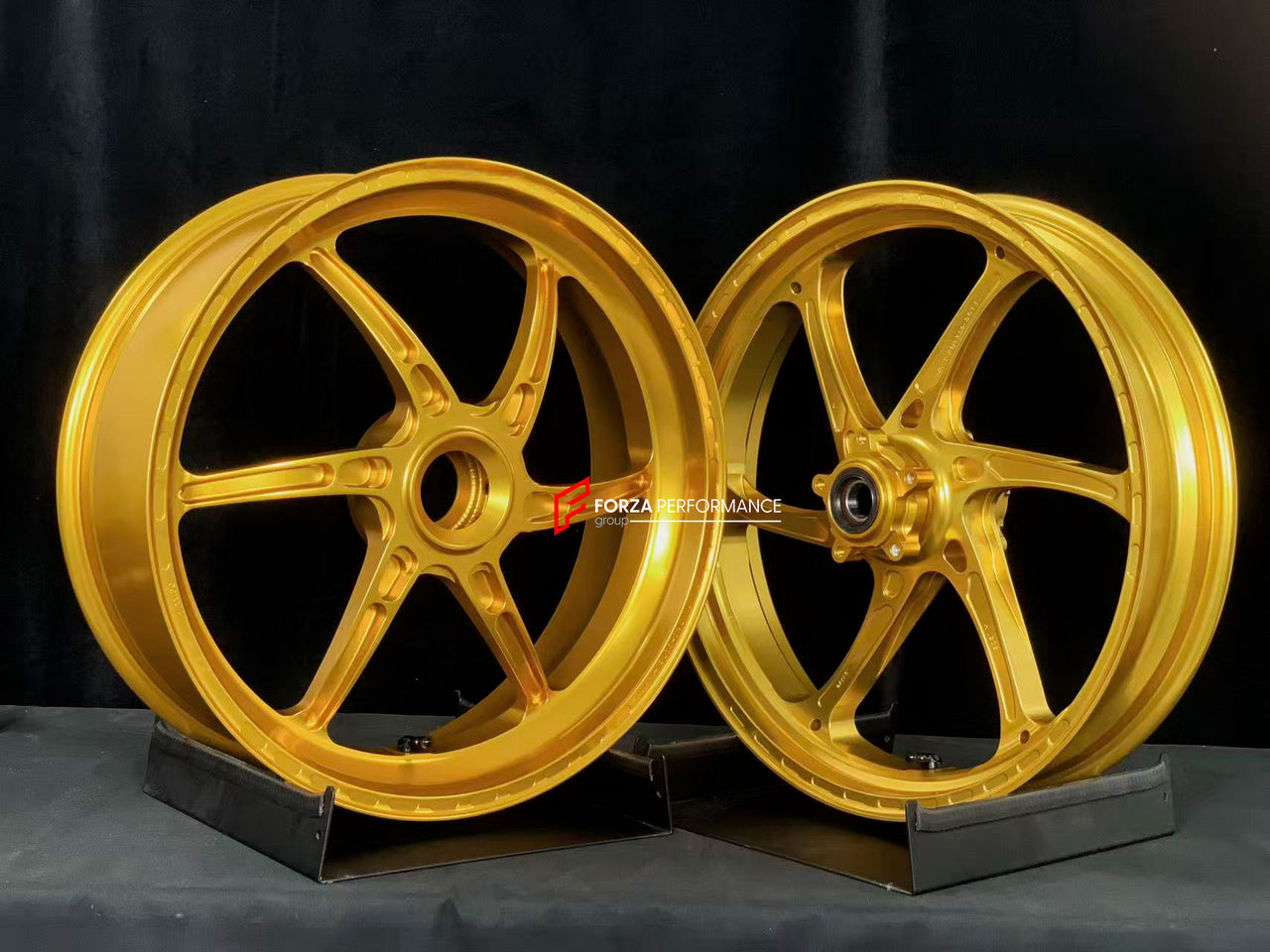 We manufacture premium quality forged motorcycle wheels rims for DUCATI PANIGALE V4 V4S V4R V4 SP2 in any design, size, color.

Wheel sizes (motorcycle spec):

Front: 3.5 x 17

Rear: 6 x 17

Weight:

Front: 3.3 kg (7.27 lbs)

Rear: 3.45 kg (7.6 lbs)


Finishing: Satin Gold

Forza Performance Group engineers and manufactures each forged motorcycle wheel individually per order. This ensures precise fitment, uncompromised strength, and unique styling. Whether for racing, touring, or daily use — our wheels are 