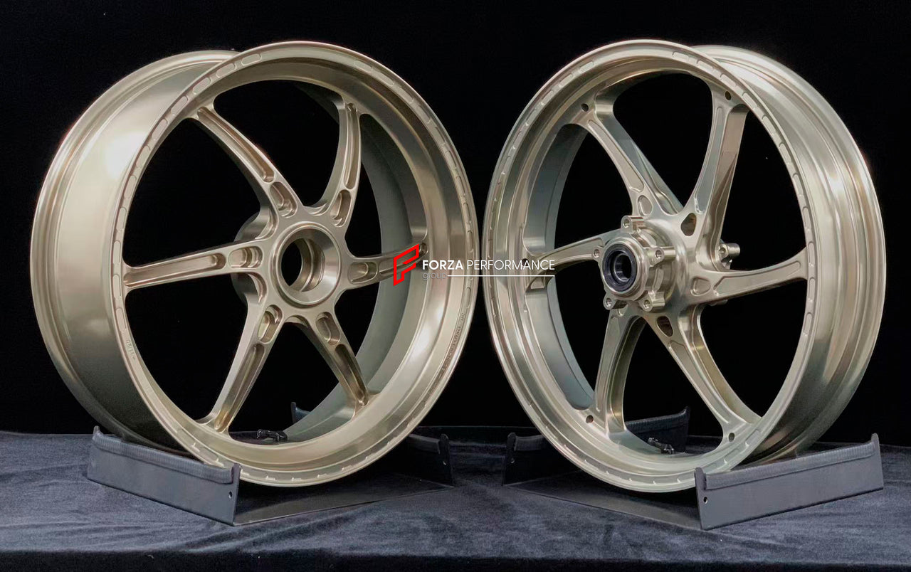 We manufacture premium quality forged motorcycle wheels rims for DUCATI PANIGALE V4 V4S V4R V4 SP2 in any design, size, color.

Wheel sizes (motorcycle spec):

Front: 3.5 x 17

Rear: 6 x 17

Weight:

Front: 3.4 kg (7.45 lbs)

Rear: 3.6 kg (7.94 lbs)


Finishing: Satin Bronze

Forza Performance Group engineers and manufactures each forged motorcycle wheel individually per order. This ensures precise fitment, uncompromised strength, and unique styling. Whether for racing, touring, or daily use — our wheels ar