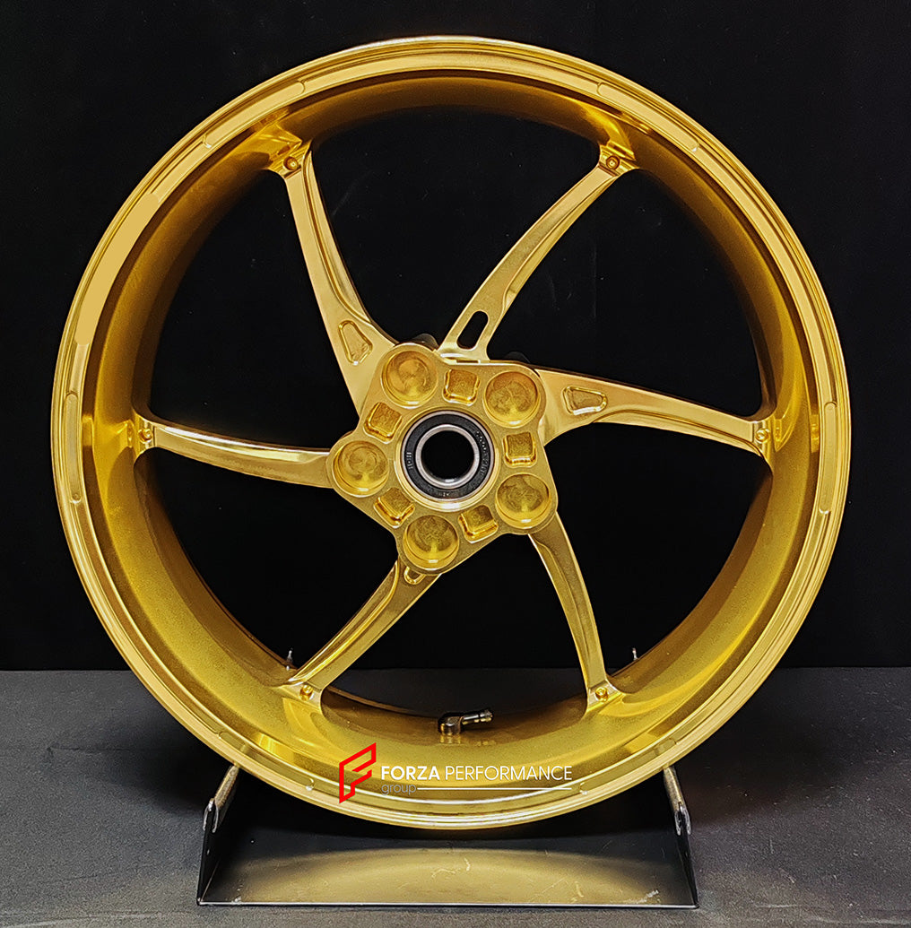 We manufacture premium quality forged motorcycle wheels rims for QJMOTOR in any design, size, color.
Wheel sizes (motorcycle spec):
Front: 3.5 x 17
Rear: 6 x 17
Weight:
Front: 3.9 kg (8.6 lbs)
Rear: 4.95 kg (10.91 lbs)
Finishing: Satin Gold
Forza Performance Group engineers and manufactures each forged motorcycle wheel individually per order. This ensures precise fitment, uncompromised strength, and unique styling. Whether for racing, touring, or daily use — our wheels are built for both performanc