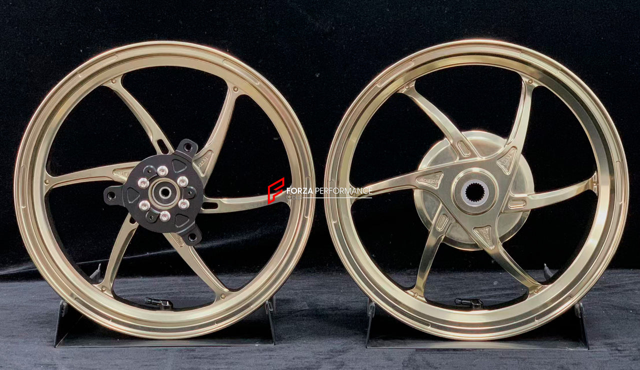We manufacture premium quality forged motorcycle wheels rims for YAMAHA in any design, size, color.
Wheel sizes (motorcycle spec):
Front: 2.5 x 14
Rear: 3.5 x 14
Weight:
Front: 2.7 kg (5.95 lbs)
Rear: 2.85 kg (6.28 lbs)
Finishing: Gloss Bronze
Forza Performance Group engineers and manufactures each forged motorcycle wheel individually per order. This ensures precise fitment, uncompromised strength, and unique styling. Whether for racing, touring, or daily use — our wheels are built for both perform
