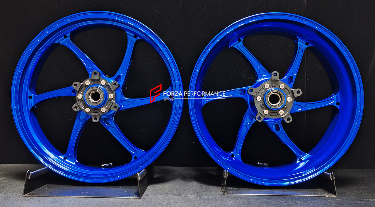 We manufacture premium quality forged motorcycle wheels rims for QJMOTOR in any design, size, color.
Wheel sizes (motorcycle spec):
Front: 3.5 x 17
Rear: 6 x 17
Weight:
Front: 4.25 kg (9.37 lbs)
Rear: 4.85 kg (10.69 lbs)
Finishing: Gloss Blue
Forza Performance Group engineers and manufactures each forged motorcycle wheel individually per order. This ensures precise fitment, uncompromised strength, and unique styling. Whether for racing, touring, or daily use — our wheels are built for both performa