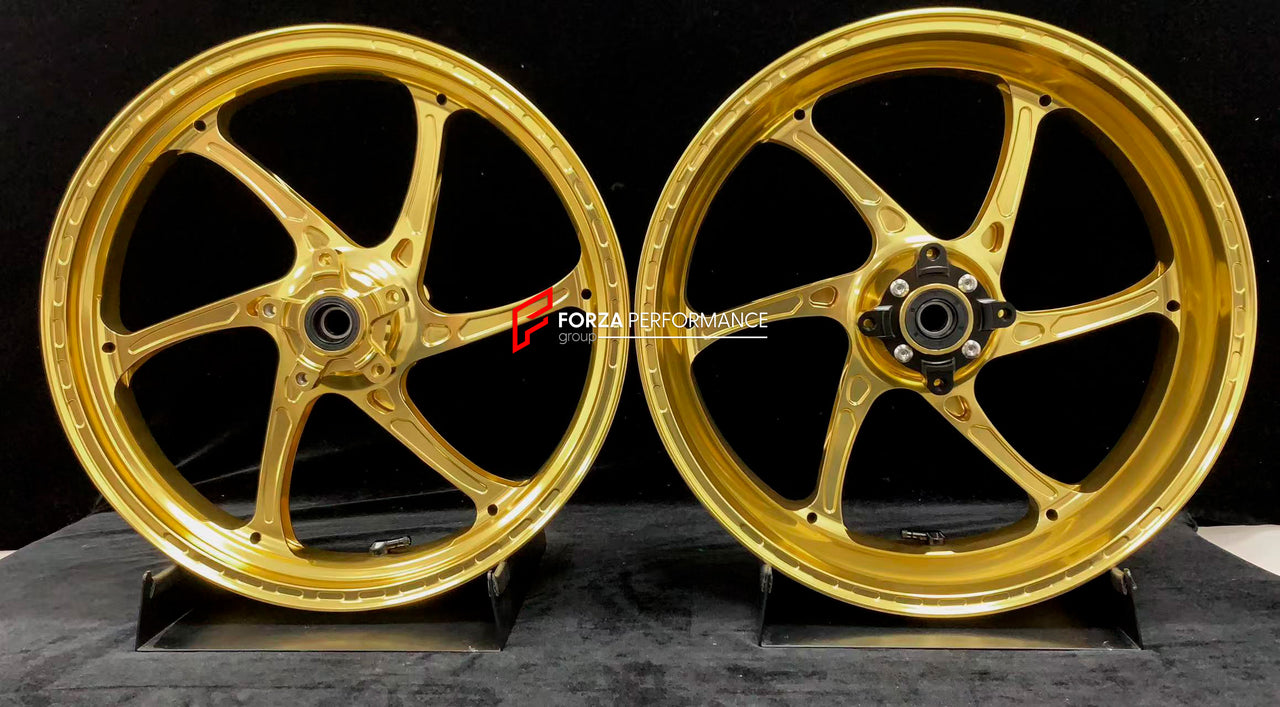 We manufacture premium quality forged motorcycle wheels rims for TRIUMPH in any design, size, color.
Wheel sizes (motorcycle spec):
Front: 3.5 x 17
Rear: 5.5 x 17
Weight:
Front: 3.9 kg (8.6 lbs)
Rear: 4.8 kg (10.58 lbs)
Finishing: Gloss Black
Forza Performance Group engineers and manufactures each forged motorcycle wheel individually per order. This ensures precise fitment, uncompromised strength, and unique styling. Whether for racing, touring, or daily use — our wheels are built for both performa