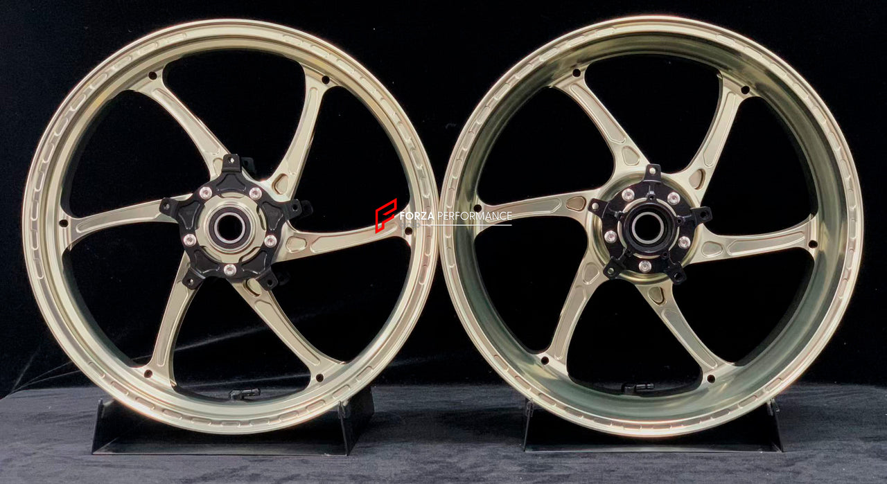 We manufacture premium quality forged motorcycle wheels rims for YAMAHA in any design, size, color.
Wheel sizes (motorcycle spec):
Front: 3.5 x 17
Rear: 6 x 17
Weight:
Front: 4.05 kg (8.93 lbs)
Rear: 5 kg (11.02 lbs)
Finishing: Gloss Bronze
Forza Performance Group engineers and manufactures each forged motorcycle wheel individually per order. This ensures precise fitment, uncompromised strength, and unique styling. Whether for racing, touring, or daily use — our wheels are built for both performanc