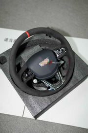 CUSTOM STEERING WHEEL for CADILLAC CT4 CT5 V

Set includes:

Steering wheel

Features:

Bolt-on and PLUG and PLAY
Our material is: harmless, light, durable, and Vibro-absorption