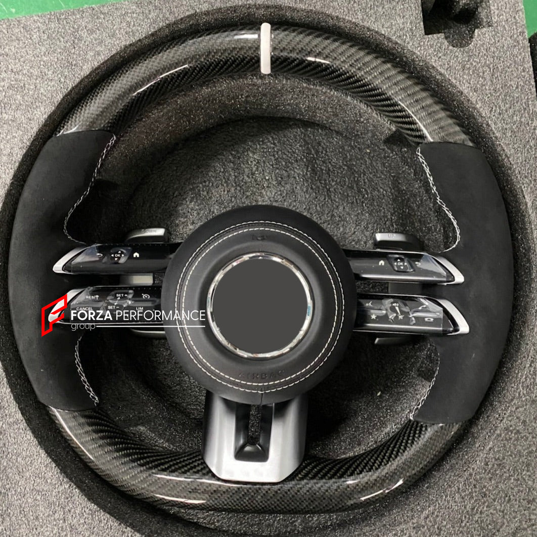 CUSTOM STEERING WHEEL for MERCEDES BENZ G-CLASS W465 G450 G350 G500 G550 AMG G63 2024+

Set includes:

Steering wheel

Features:

Bolt-on and PLUG and PLAY
Our material is: harmless, light, durable, and Vibro-absorption

For an extra cost:


LCD display
Airbag
Airbag cover
Shift paddles
Any color of stitching
Any material such as Alcantara, carbon, leather
Heating and vibration function
Full customization according to your preference

Production time: 10 days