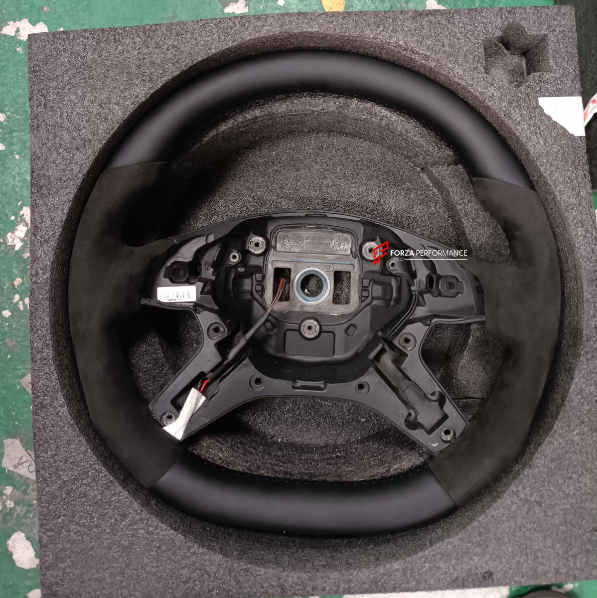 CUSTOM STEERING WHEEL (IN STOCK) for MERCEDES BENZ G CLASS W463 1990 - 2017
Set includes:

Steering Wheel Core
Material: Black Leather (12 and 6 o'clock) + Black Alcantara (9 and 3 o'clock) with Black Stitching

NOTE: Supplied as core only - without buttons, airbag or paddle shift trim. Professional installation is required.
