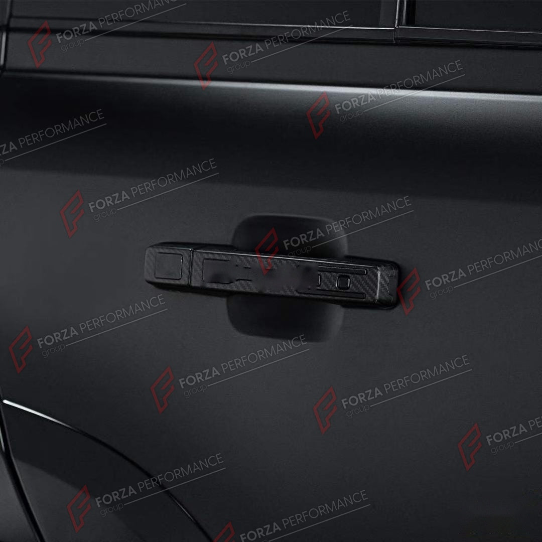 DOOR HANDLE COVER for LAND ROVER DEFENDER 90 110 130 L663 2020+

Set includes:
Door Handle Covers
Tailgate Handle Cover

Material: ABS with Carbon Fiber Finish

NOTE: Professional installation is required.