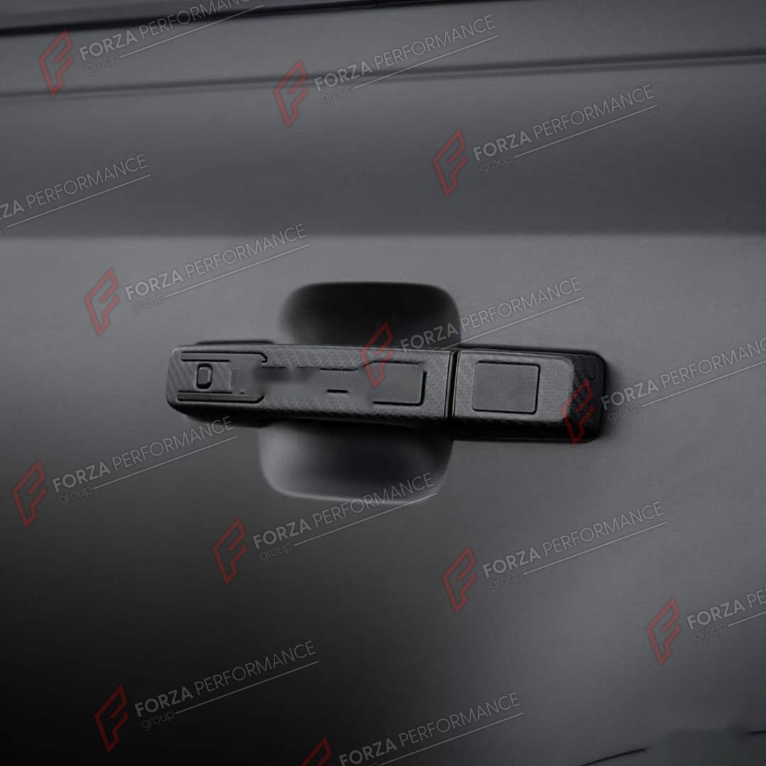 DOOR HANDLE COVER for LAND ROVER DEFENDER 90 110 130 L663 2020+

Set includes:
Door Handle Covers
Tailgate Handle Cover

Material: ABS with Carbon Fiber Finish

NOTE: Professional installation is required.