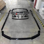 AERO BODY KIT FOR BMW 7 SERIES G70 M760 2022  Set includes:  Front Lip Side Skirts Roof Spoiler Rear Spoiler Rear Diffuser Exhaust Tips