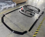AERO BODY KIT FOR BMW 7 SERIES G70 M760 2022  Set includes:  Front Lip Side Skirts Roof Spoiler Rear Spoiler Rear Diffuser Exhaust Tips
