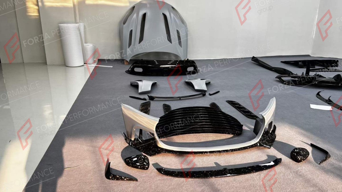 DRY CARBON BODY KIT for ASTON MARTIN DB11 AM5 2016 - 2023 FORZA PERFORMANCE custom fit Mansory Style

Set includes:
Front Lip
Front Bumper Assembly
Front Grille
Hood Bonnet
Side Fender Vents
Side Mirror Covers
Ducktail Spoiler
Rear Bumper
Rear Diffuser

Material: Dry Carbon

NOTE: Professional installation is required.