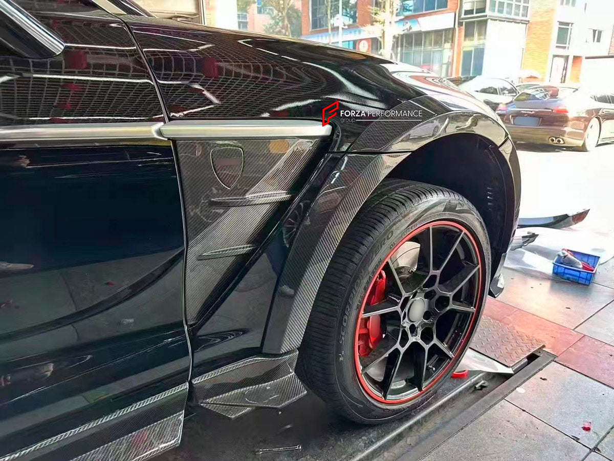 DRY CARBON BODY KIT for Aston Martin DBX AM8 2020 - 2024
Set includes:

Front Lip
Front Canards
Hood Air Vents
Side Mirrors
Side Fenders
Side Air Vents
Side Skirts
Rear Bumper
Rear Spoiler Wing
Exhaust System
Exhaust Tips
Material: Dry Carbon

NOTE: Professional installation is required.