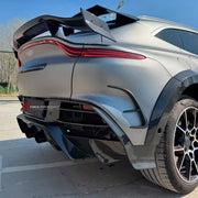 DRY CARBON BODY KIT for Aston Martin DBX AM8 2020 - 2024
Set includes:

Front Lip
Front Canards
Hood Air Vents
Side Mirrors
Side Fenders
Side Air Vents
Side Skirts
Rear Bumper
Rear Spoiler Wing
Exhaust System
Exhaust Tips
Material: Dry Carbon

NOTE: Professional installation is required.