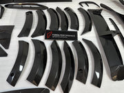 DRY CARBON BODY KIT for Aston Martin DBX AM8 2020 - 2024
Set includes:

Front Lip
Front Canards
Hood Air Vents
Side Mirrors
Side Fenders
Side Air Vents
Side Skirts
Rear Bumper
Rear Spoiler Wing
Exhaust System
Exhaust Tips
Material: Dry Carbon

NOTE: Professional installation is required.