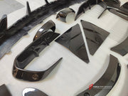 DRY CARBON BODY KIT for Aston Martin DBX AM8 2020 - 2024
Set includes:

Front Lip
Front Canards
Hood Air Vents
Side Mirrors
Side Fenders
Side Air Vents
Side Skirts
Rear Bumper
Rear Spoiler Wing
Exhaust System
Exhaust Tips
Material: Dry Carbon

NOTE: Professional installation is required.